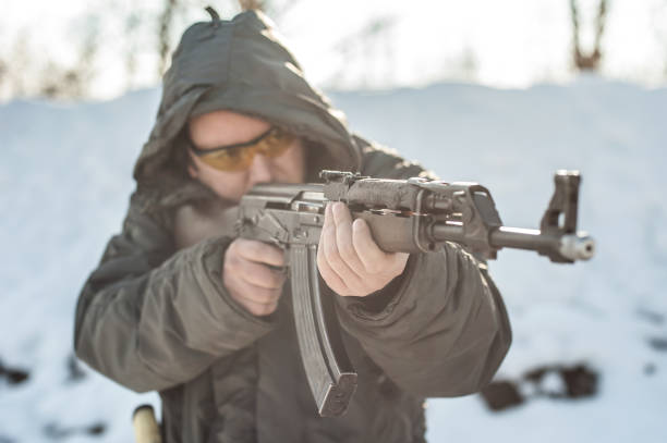 istock Front view gun point riffle machine gun. Shooting and weapons 1127735175