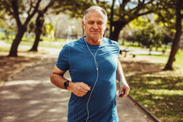 istock Senior man enjoying his workout in park 1127737718