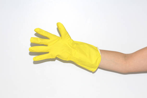 istock Rubber gloves are worn on the female hand. 1127738287