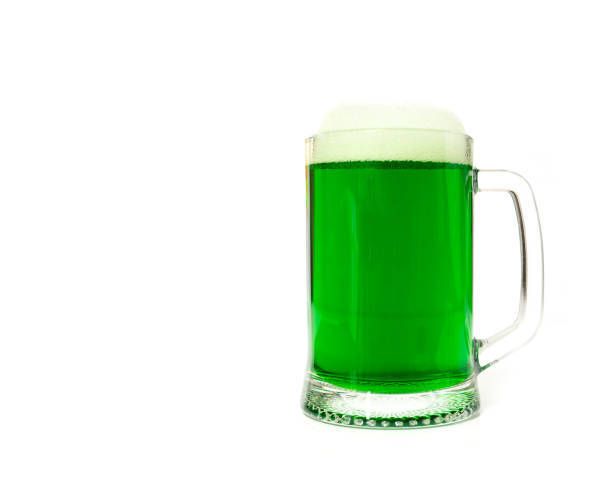 istock One glass of green beer. 1127738468