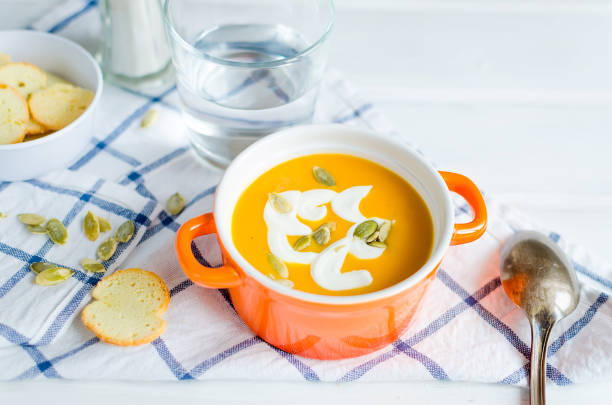 istock Homemade Pumpkin soup in ceramic bowl 1127738685