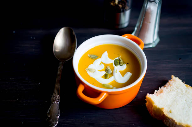 istock Homemade Pumpkin soup in ceramic bowl 1127739502