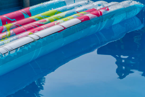istock sunny airbed and pool scenery 1127739660