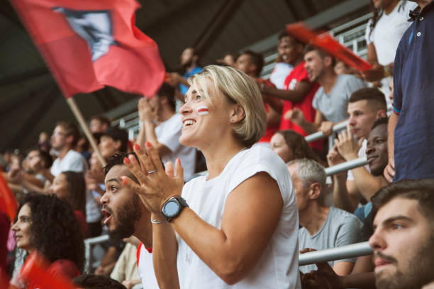 istock Spectators watching football match 1127739887