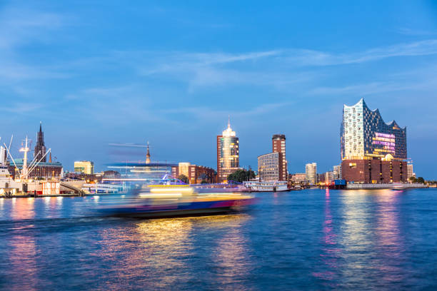 istock Skyline Hamburg with River Elbe at sunset 1127740735