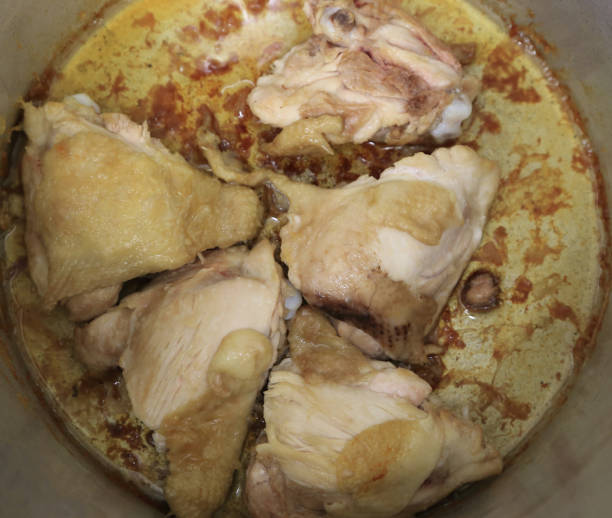 istock Chicken in a pot prepare for make soup stock. 1127741504