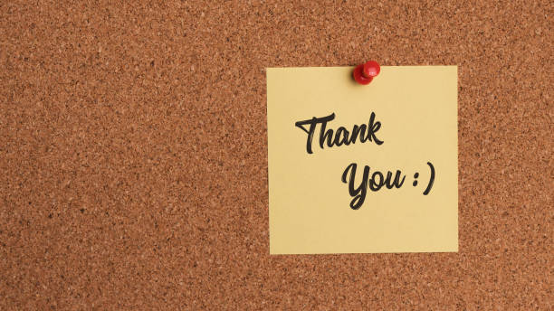 istock Note with the words thank you on cork board 1127741744