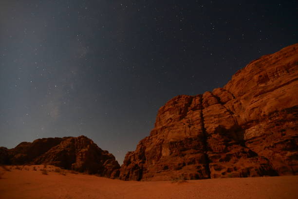 istock Night sky in Wadi Rum mountain in Jordan 1127742911