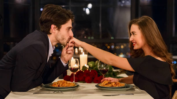 istock Man kissing hand of his girlfriend. 1127746646