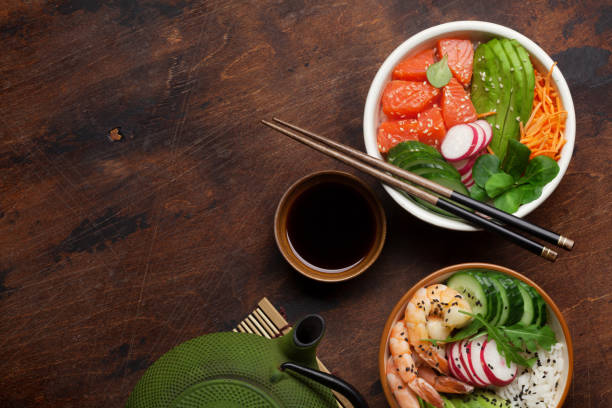 istock Poke bowl with salmon, shrimps and vegetables 1127749949