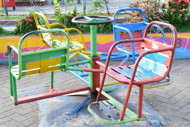 istock colorful chairs in amusement park 1127753038