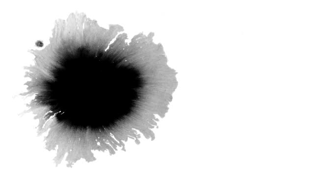 Ink droplets fall to the surface in 4k. Alpha.