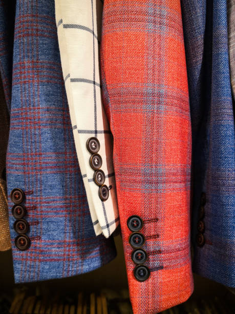 istock Coats sleeves in a shop 1127758451