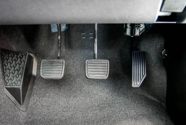 Photo of Accelerator, brake pedal and clutch pedal of manual gear car