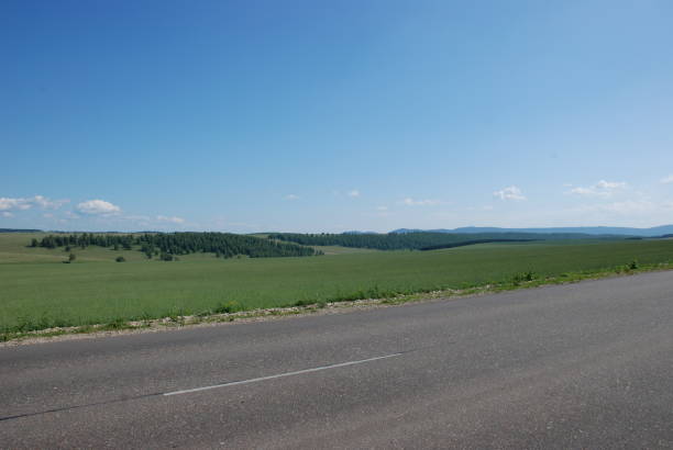 istock Blue sky above the road 1127760168