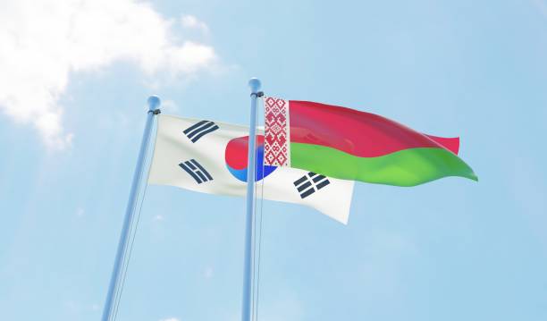 istock South Korea and Belarus, two flags waving against blue sky 1127761586