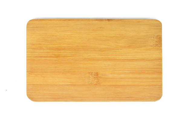 istock Wooden cutting board isolated on white background 1127761776