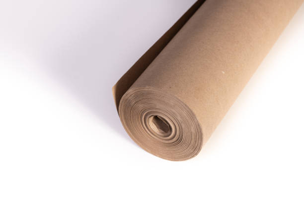 rotolo di carta marrone contractor - packaging paper cardboard rolled up foto e immagini stock