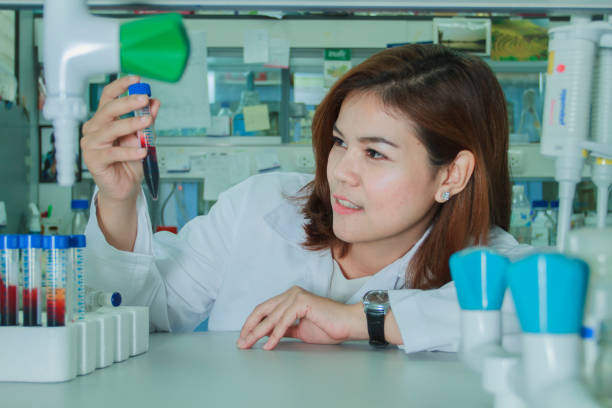 istock Close-Up Of Scientist Performing Experiment At Laboratory 1127765367
