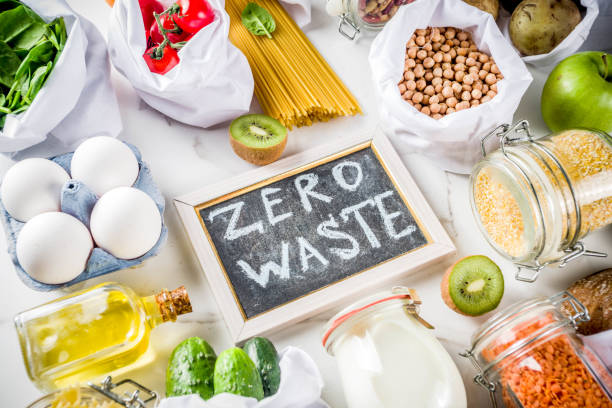 Zero waste shopping concept Zero waste shopping and sustanable lifestyle concept, various farm organic vegetables, grains, pasta, eggs and fruits in reusable packaging supermarket bags. copy space top view, white concrete table zero photos stock pictures, royalty-free photos & images