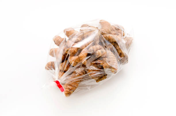 istock Wild Turmeric (Curcuma aromatica salisb) in Plastic bag on white background 1127770902
