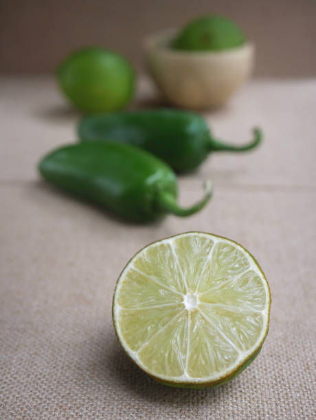 lime and jalapeno peppers - fressness imagens e fotografias de stock