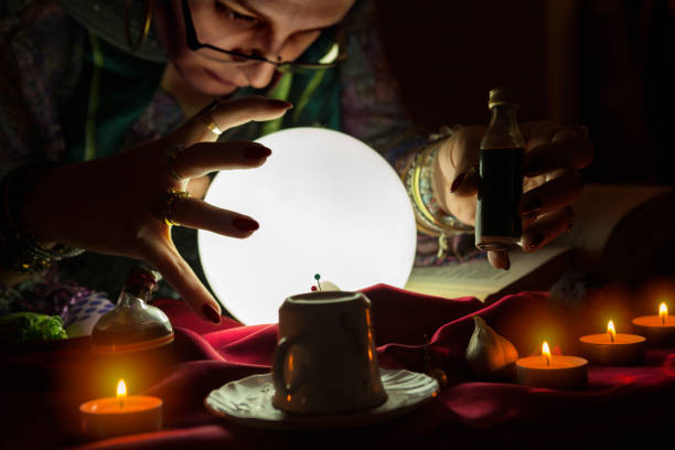 istock Female fortune teller with love potion 1127771932