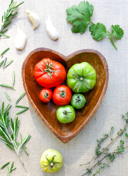 istock tomatoes and herbs for home cooking 1127772972