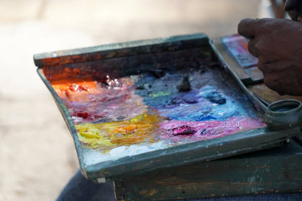 istock Man painting with hand 1127773723