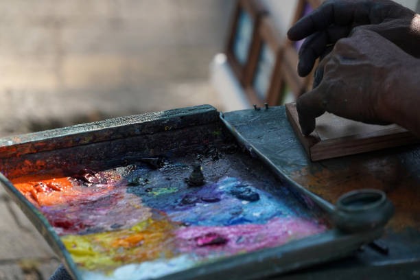 istock Man painting with hand 1127773739