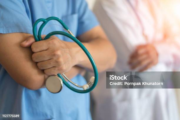 Surgeon Physician Anesthetist Or Anesthesiologist In Uniform With Stethoscope In Hospital Or Clinic As Medical Doctor Team Force Stock Photo - Download Image Now