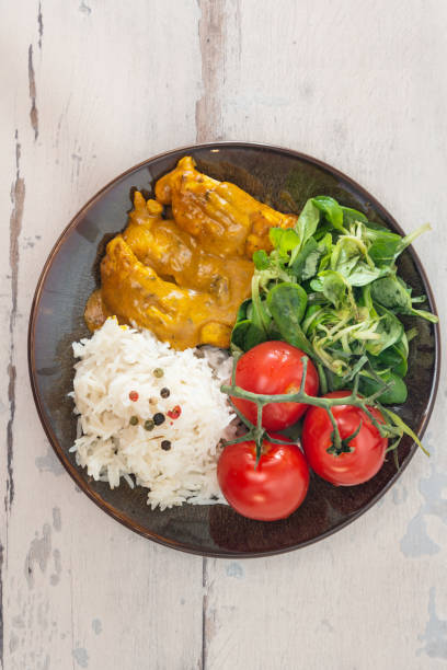 istock delicious Rice and chicken on plate 1127775763