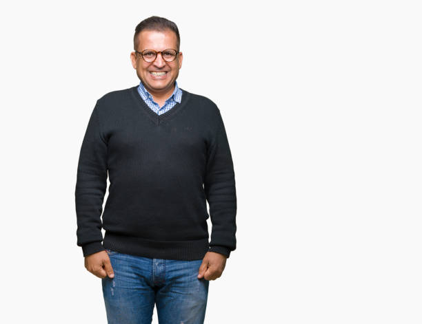 istock Middle age bussines arab man wearing glasses over isolated background with a happy and cool smile on face. Lucky person. 1127775863
