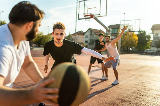istock Dynamic basketball game outdoor 1127775973