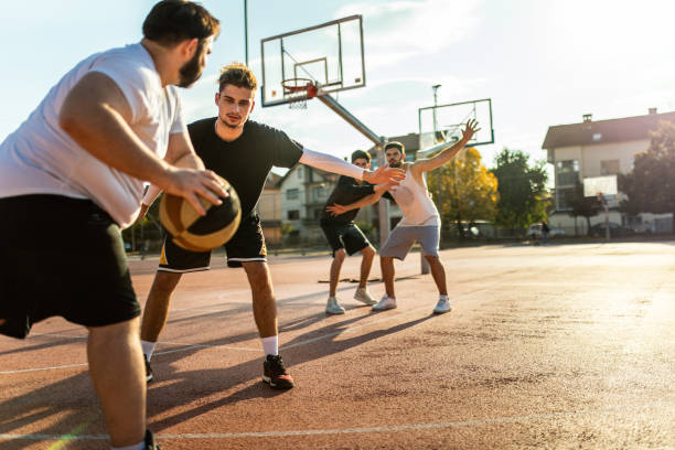 istock Dynamic basketball game outdoor 1127775995