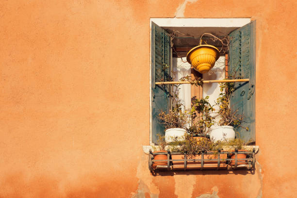 Typical Venice window in Winter time, sunny day - Italy