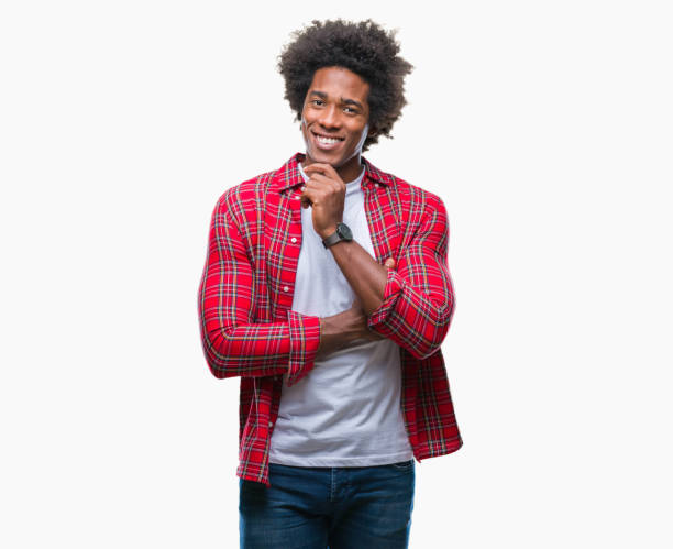 istock Afro american man over isolated background looking confident at the camera with smile with crossed arms and hand raised on chin. Thinking positive. 1127776878