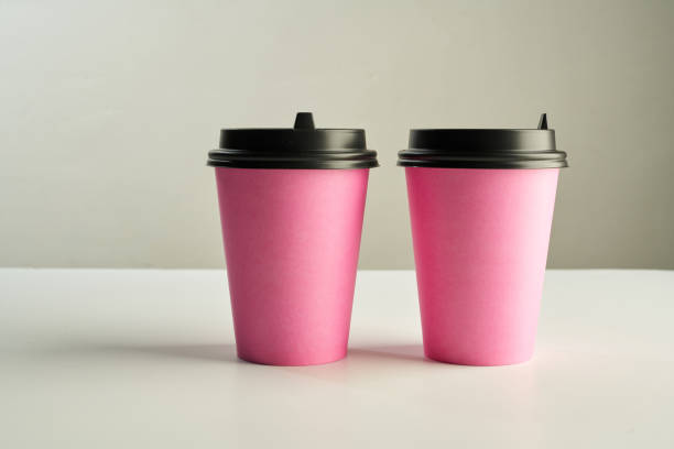 istock Paper coffee disposable cup for take away or to go, wooden table, space for design mock-up. 1127778507