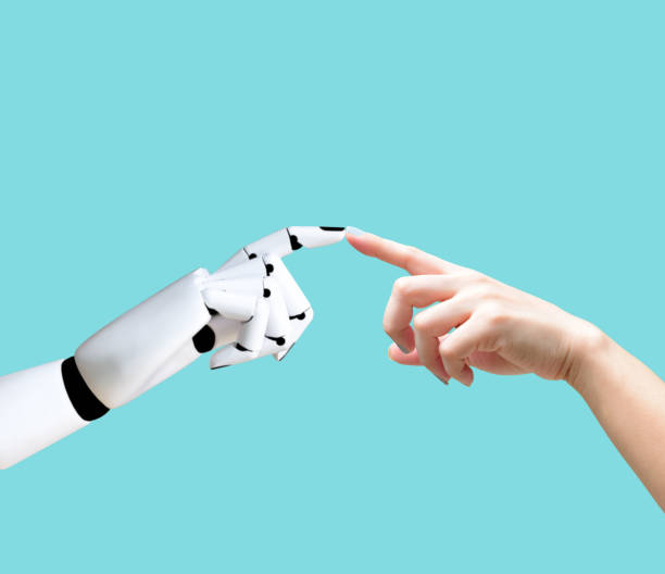 istock Human hand and robot hand system concept Integration and coordination of intellectual technology and vintage 1127782837