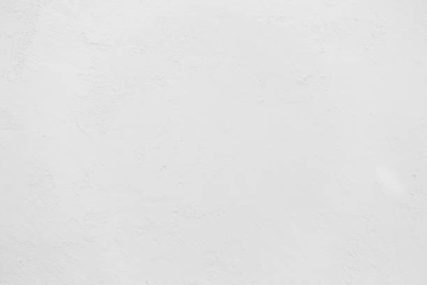 istock Loft-style plaster walls, gray, white, empty space used as wallpaper. Popular in home design or interior design. with copy spaces. 1127783848