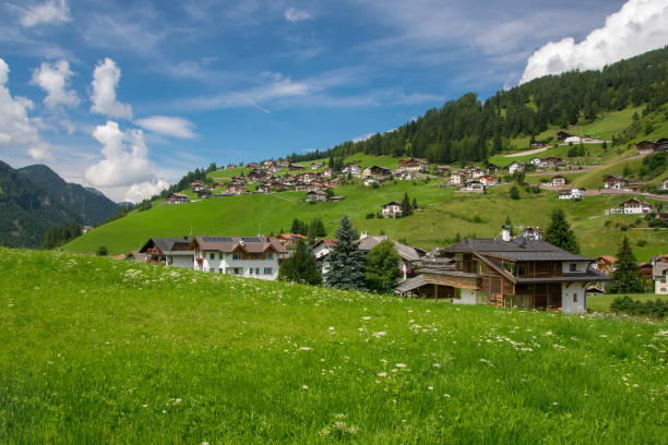 istock Scenic view of alpine village in Dolomites 1127784351