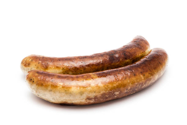 german bratwurst isolated on white background - cooked studio shot close up sausage imagens e fotografias de stock