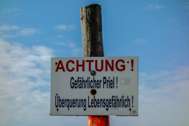 istock Beware sign dangerous Priel at the North Sea 1127786008