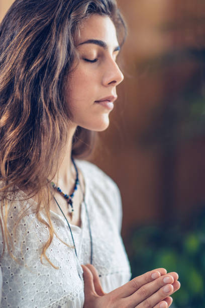 istock Young Woman Doing Yoga 1127787002