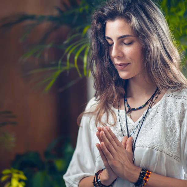 istock Young Woman Doing Yoga 1127787186