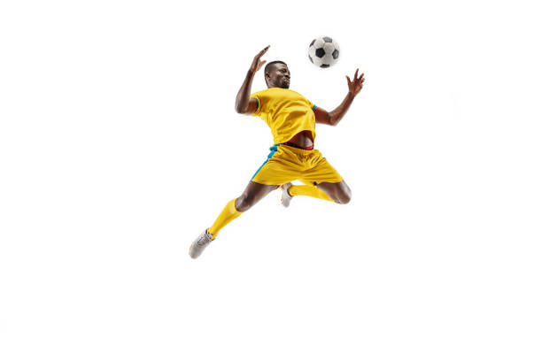 joueur de soccer football africain isolé sur fond blanc - football ball isolated sport photos et images de collection