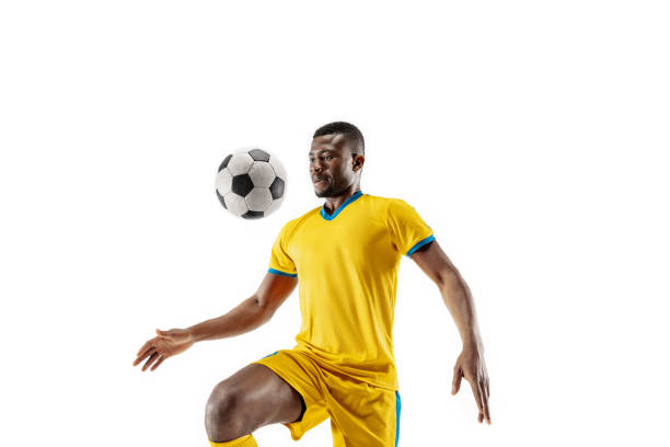 jogador de futebol do futebol africano isolado no fundo branco - football player american football sport professional sport - fotografias e filmes do acervo