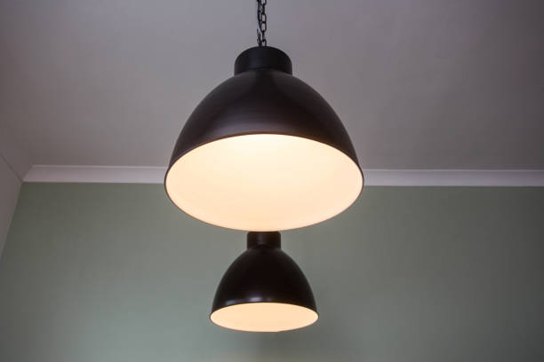 istock Ceiling light closeup, hanging from the ceiling modern design. home decoration 1127793448