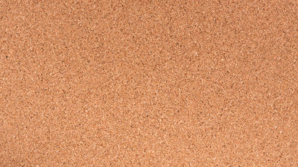 Brown textured cork board closeup for notes stock photo
