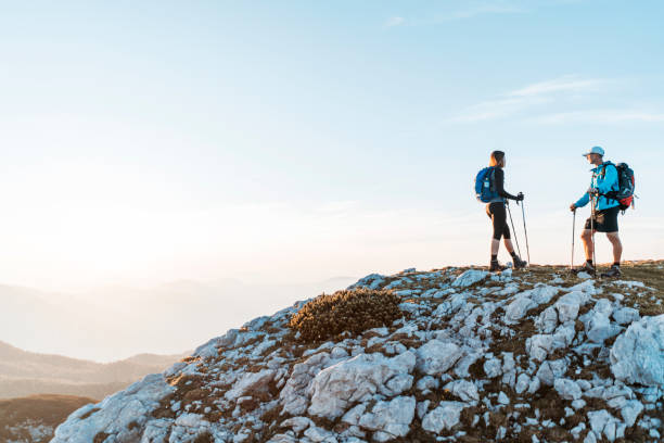 istock Couple on top of the mountain 1127795260